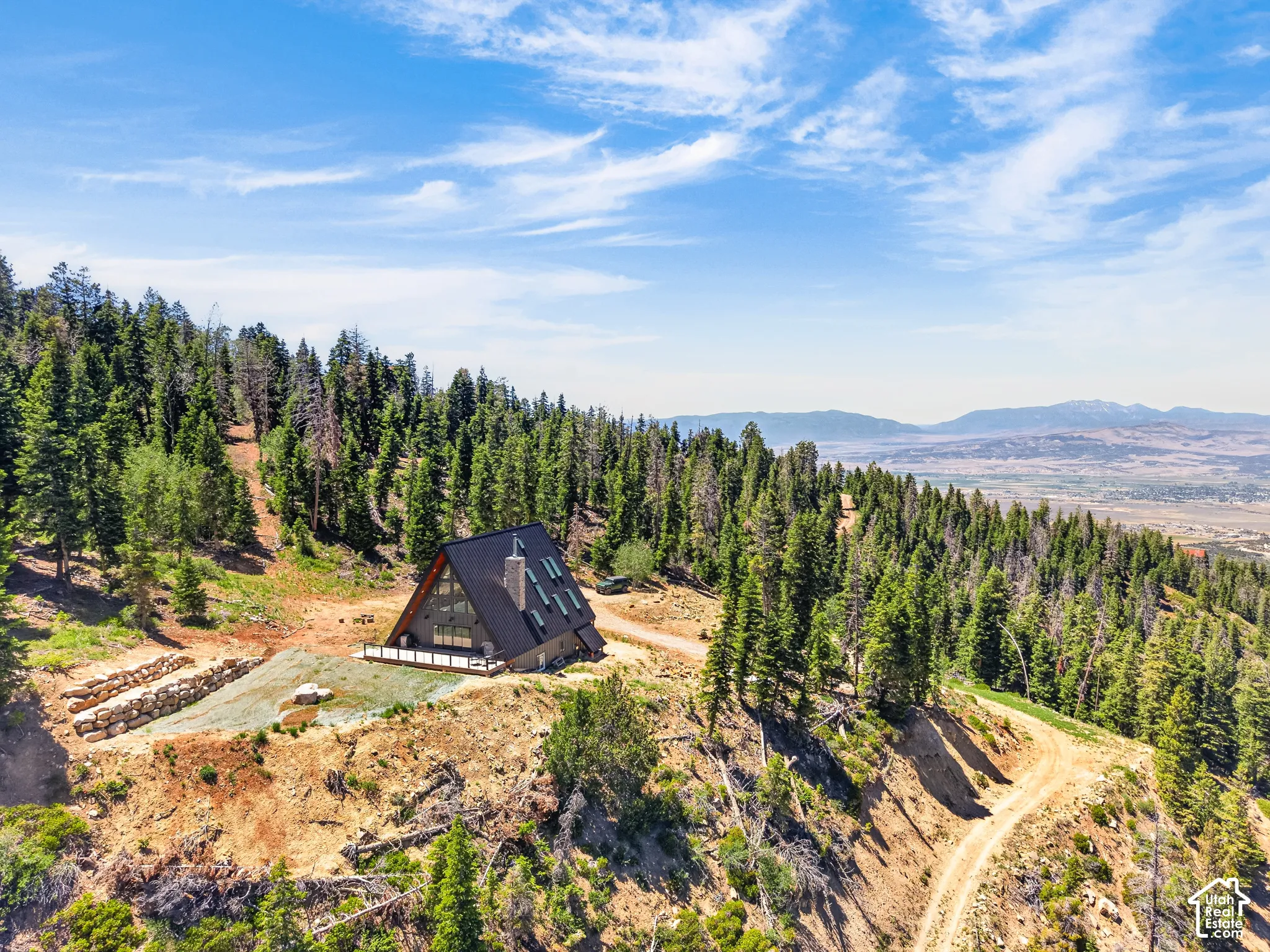 A-frame residence situated on a natural, sloped lot