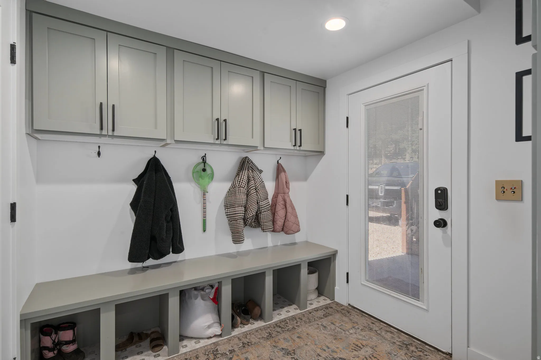 Mudroom featuring recessed lighting