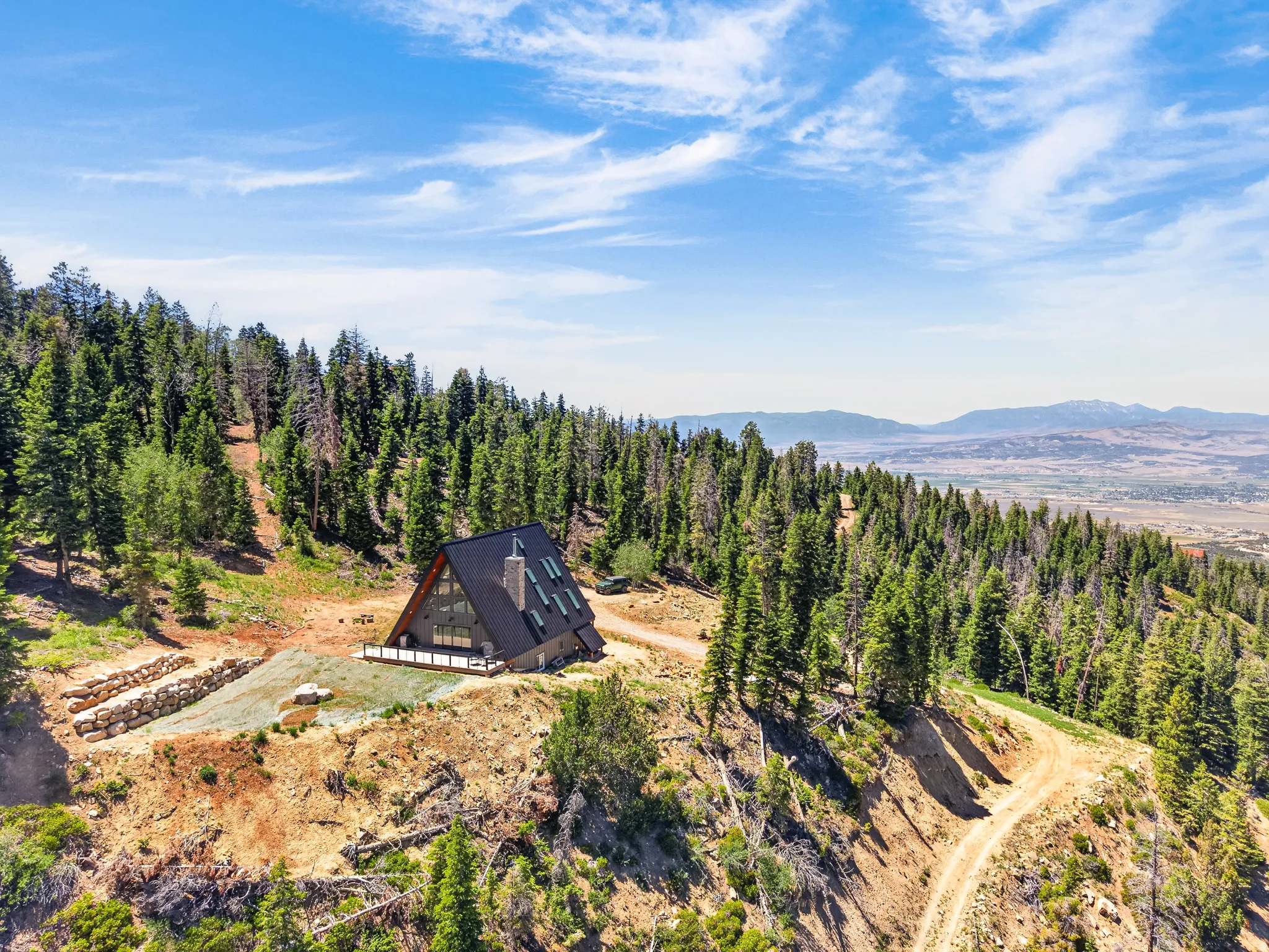 A-frame residence situated on a natural, sloped lot