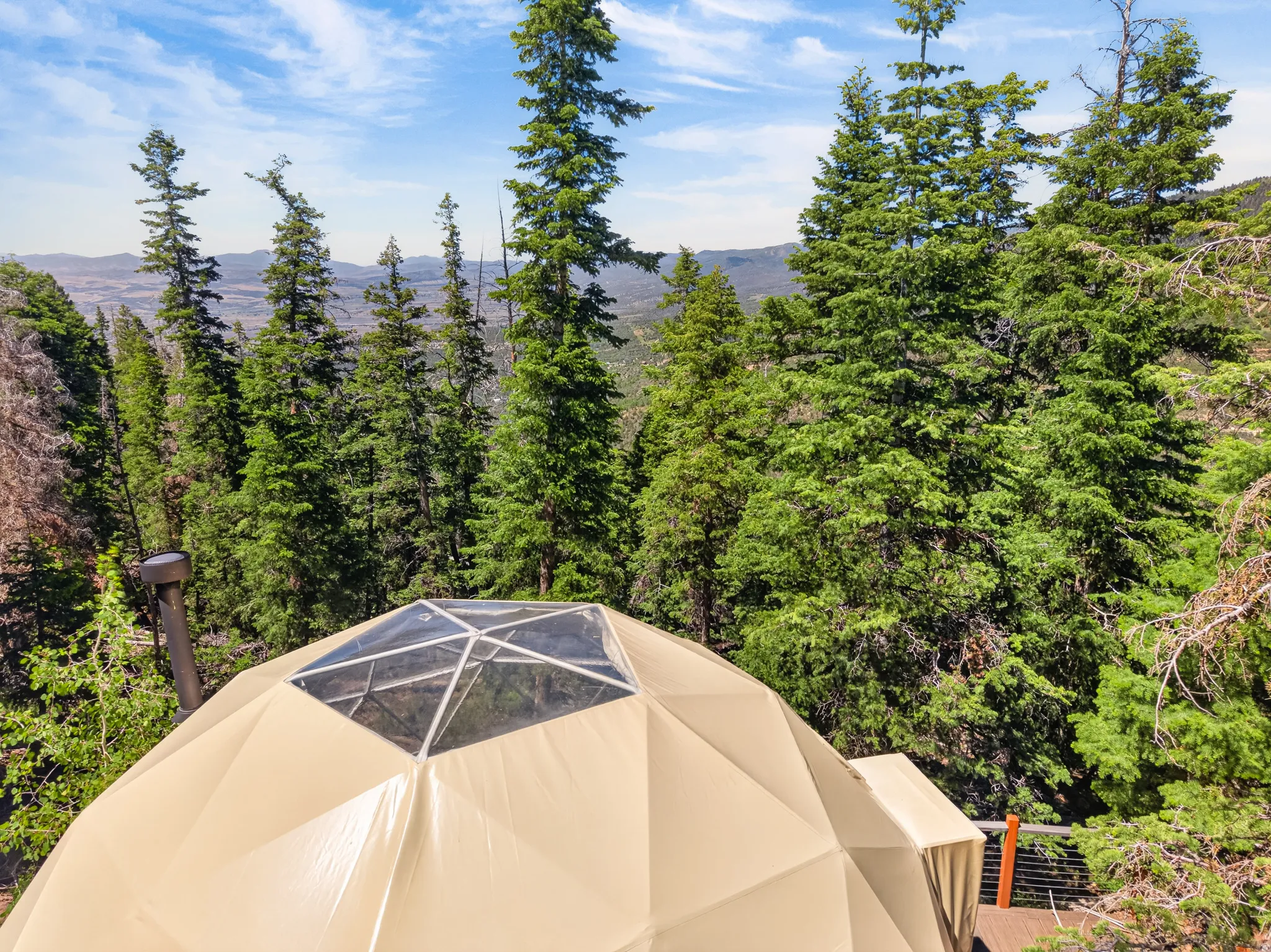 Geodesic dome structure featuring a clear central skylight