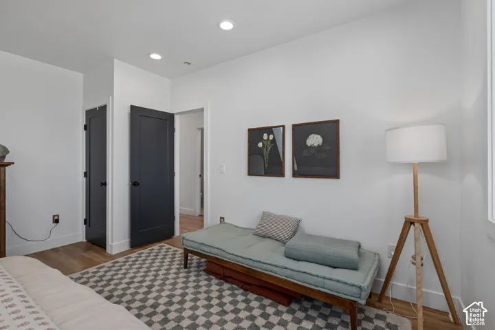 Bedroom featuring light wood-style floors and recessed lighting