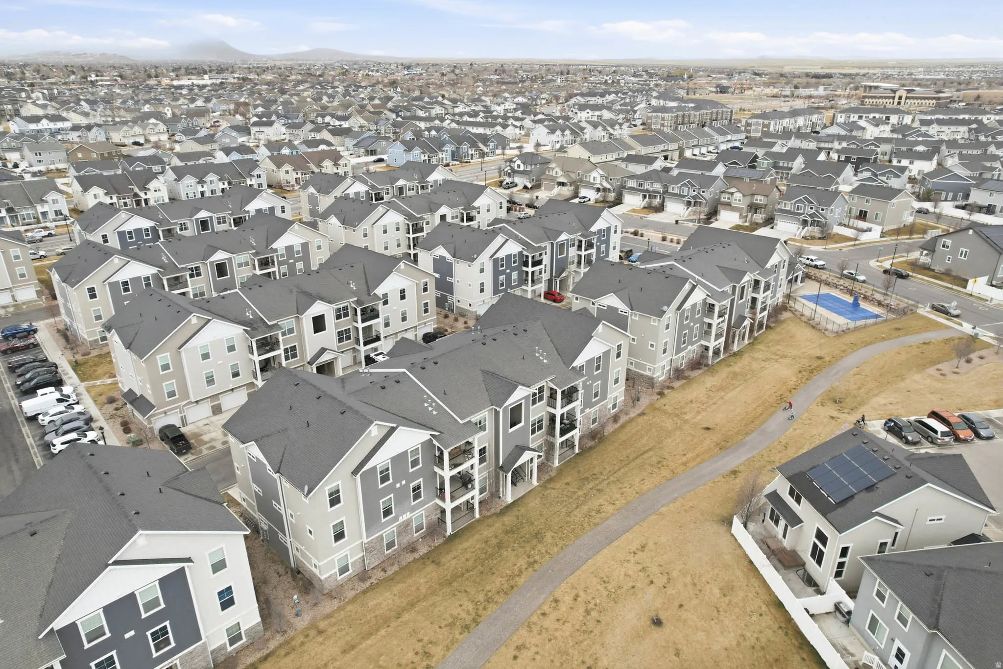 Aerial overview of property's location featuring nearby suburban area