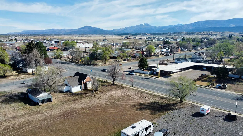 Aerial view of residential area with a mountainous background