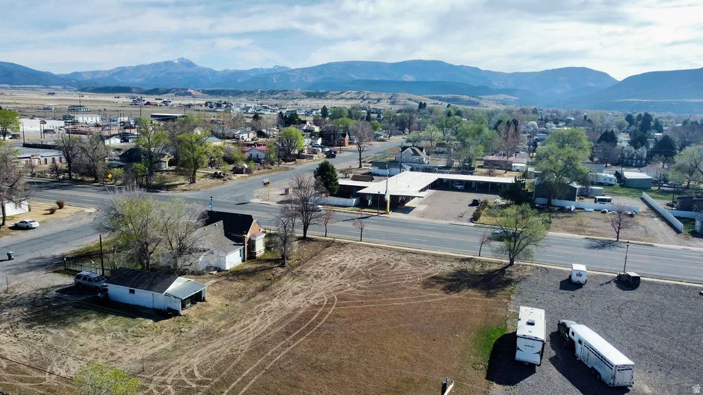 Aerial view of residential area featuring mountains