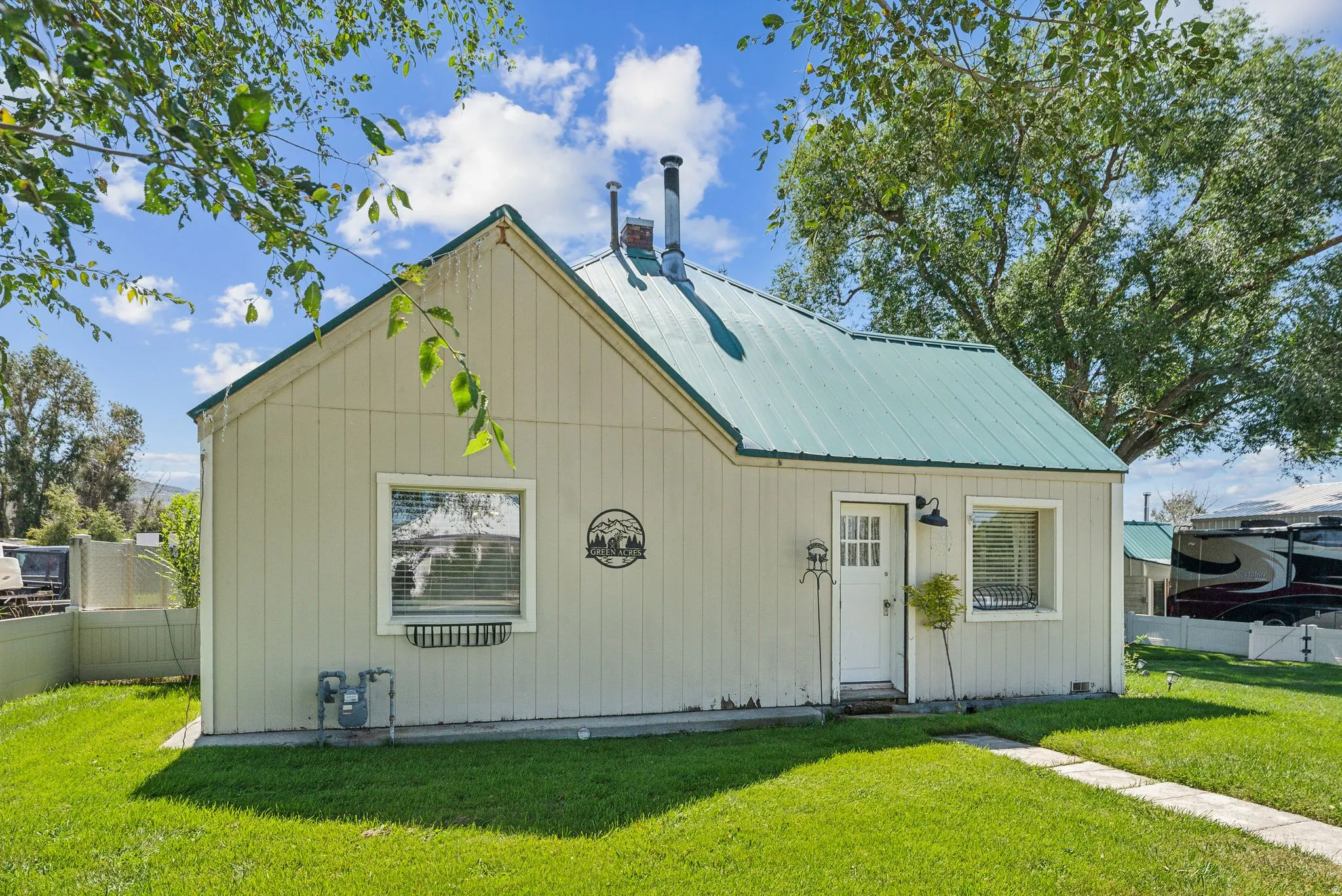 View of front of home with a metal roof