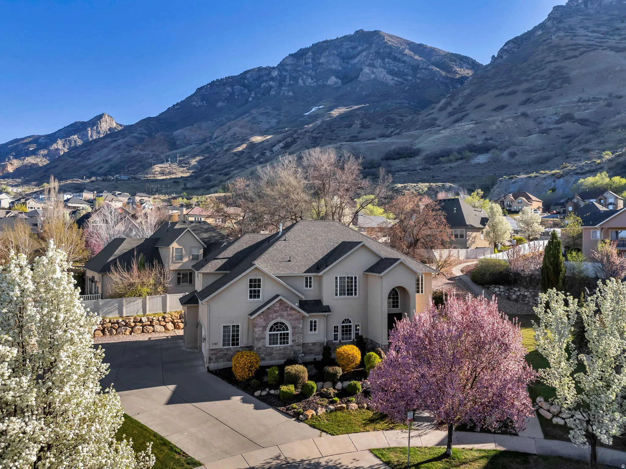 View of mountain background featuring nearby suburban area
