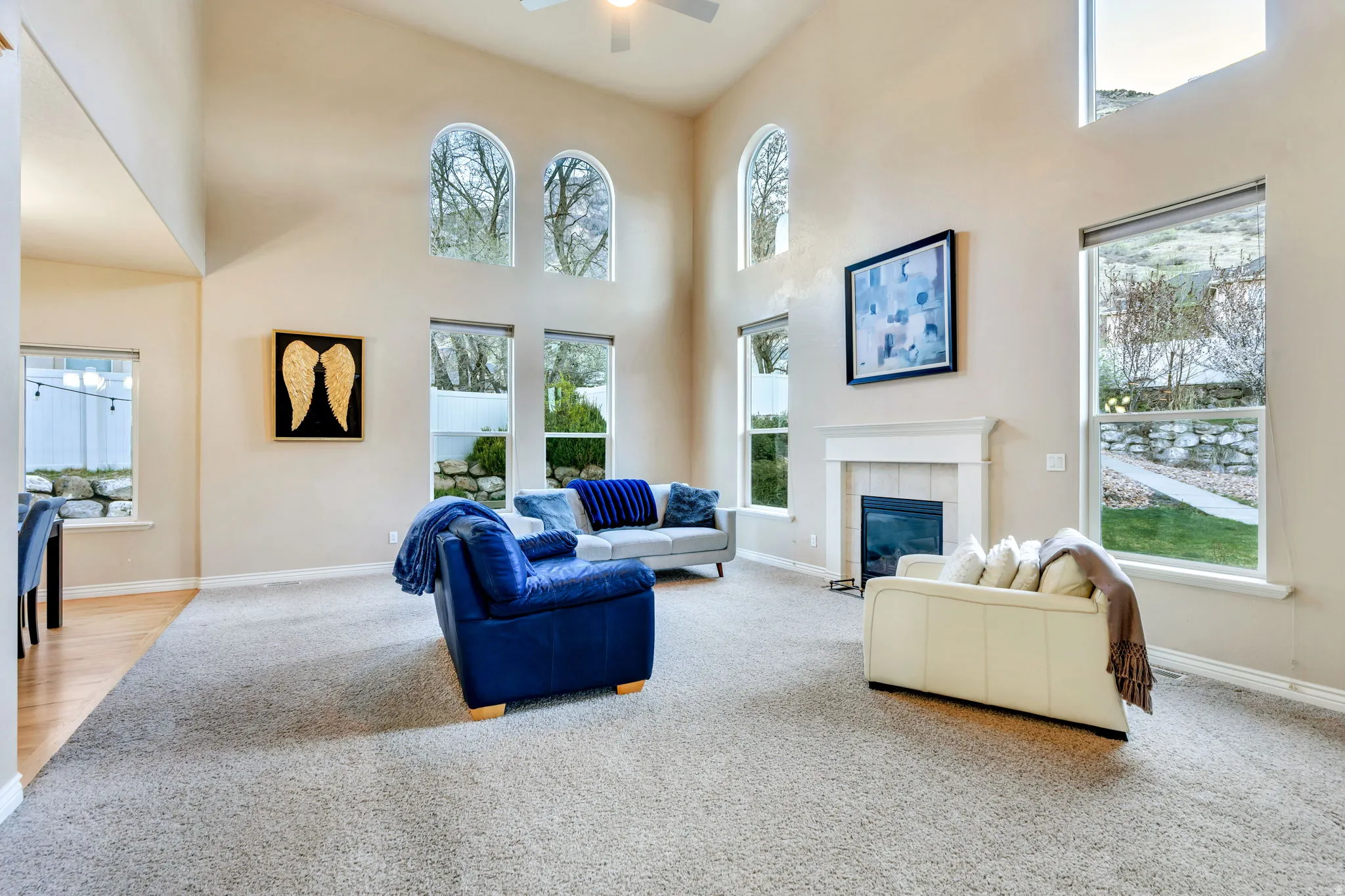 Family room has fireplace and vaulted ceiling