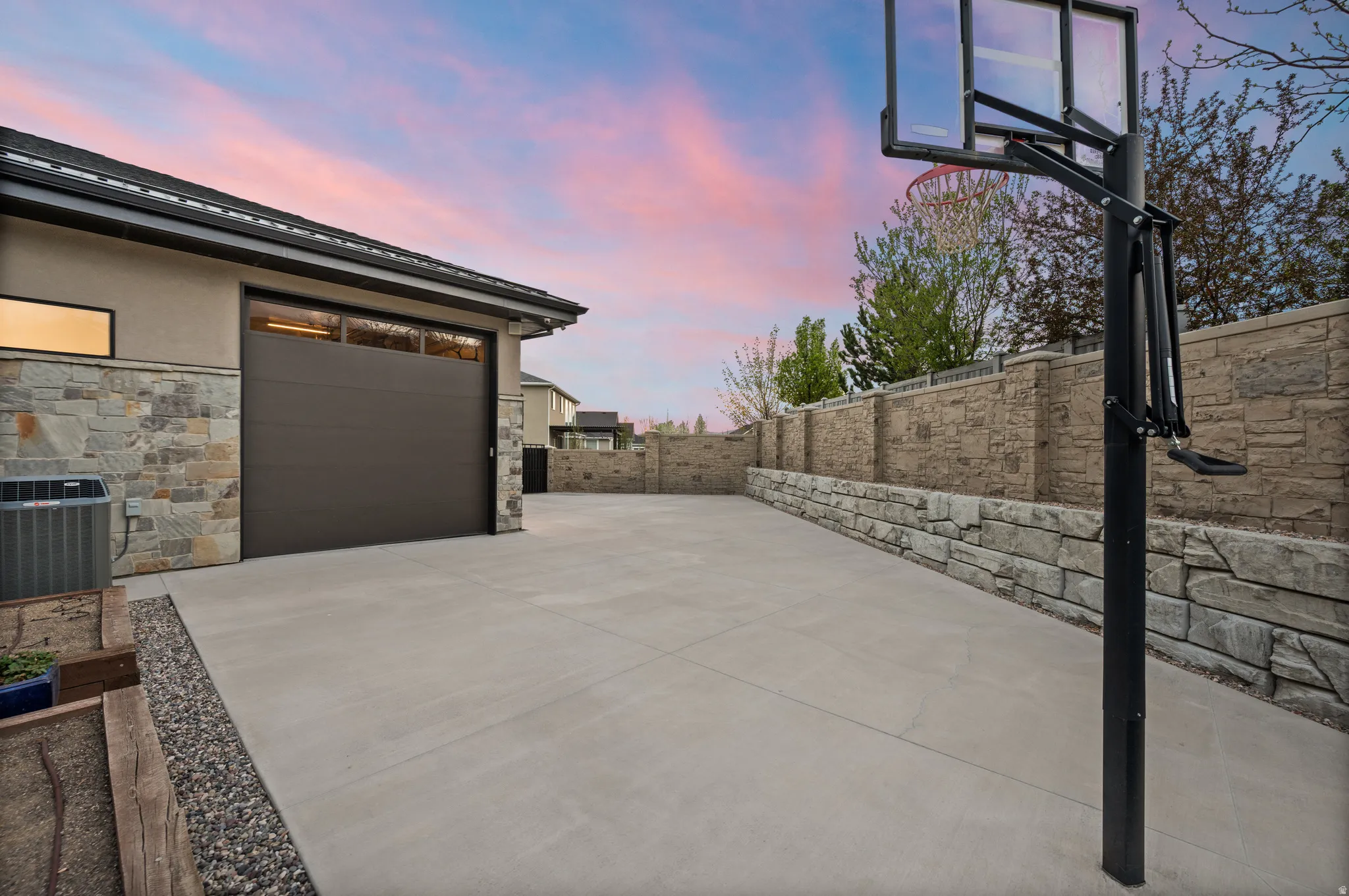 Side of home with Pull Through Garage