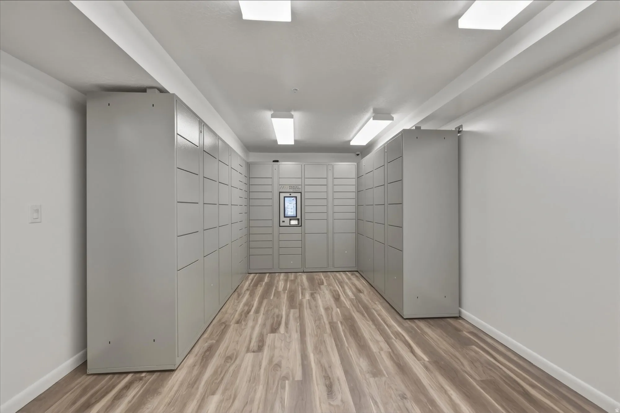 View of property's community featuring a package area