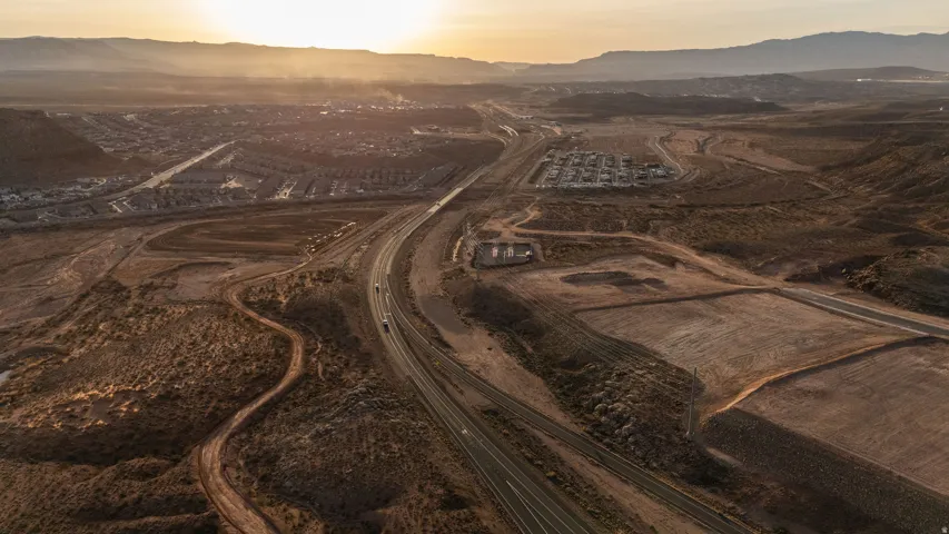 Aerial view at dusk of a mountain view and a view of countryside