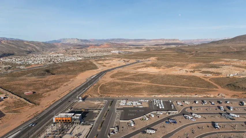 Aerial view of property and surrounding area with mountains and rural landscape