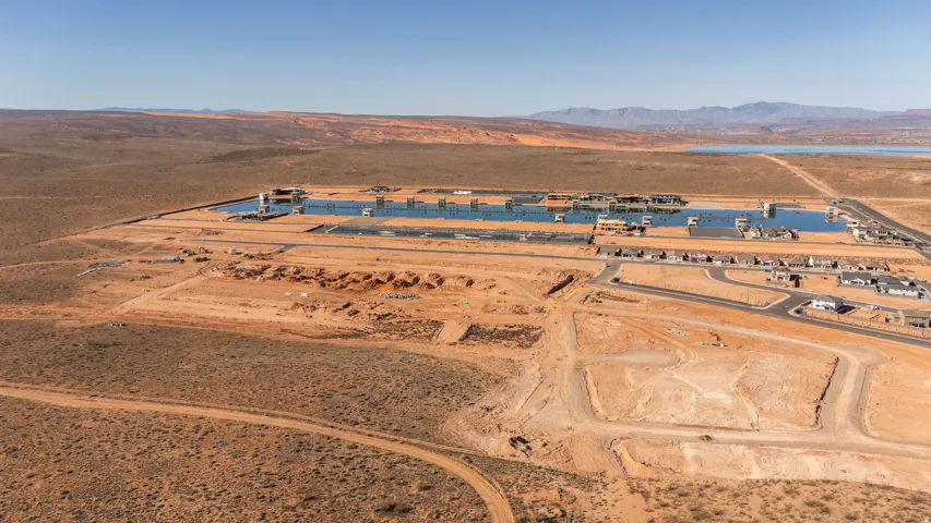 Aerial view of sparsely populated area with a desert landscape and mountains
