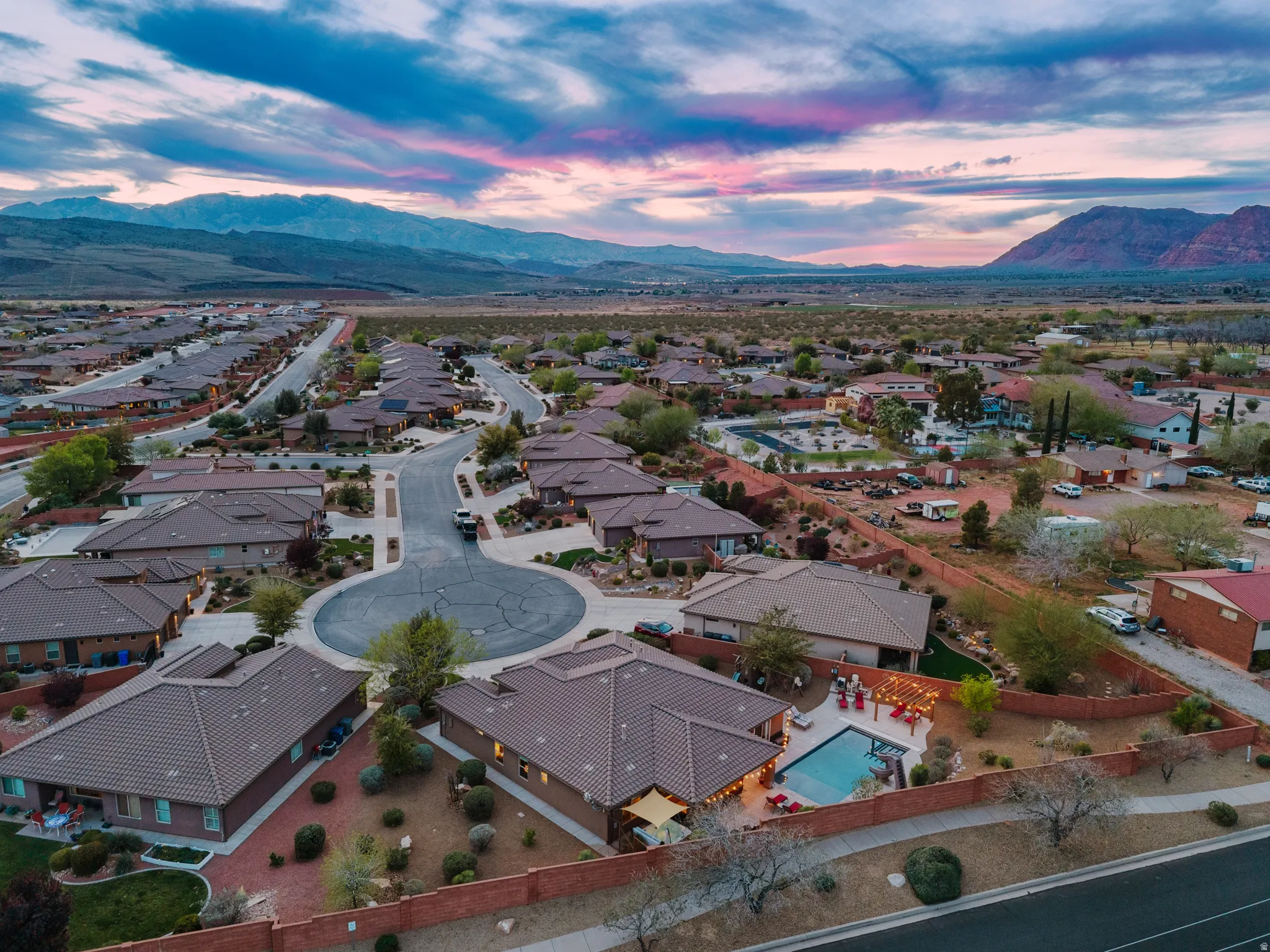 Aerial view at dusk of a mountain view and a residential view
