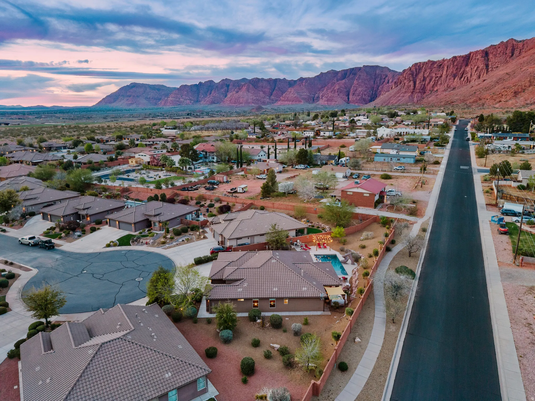 Aerial view at dusk of a mountain view and a residential view