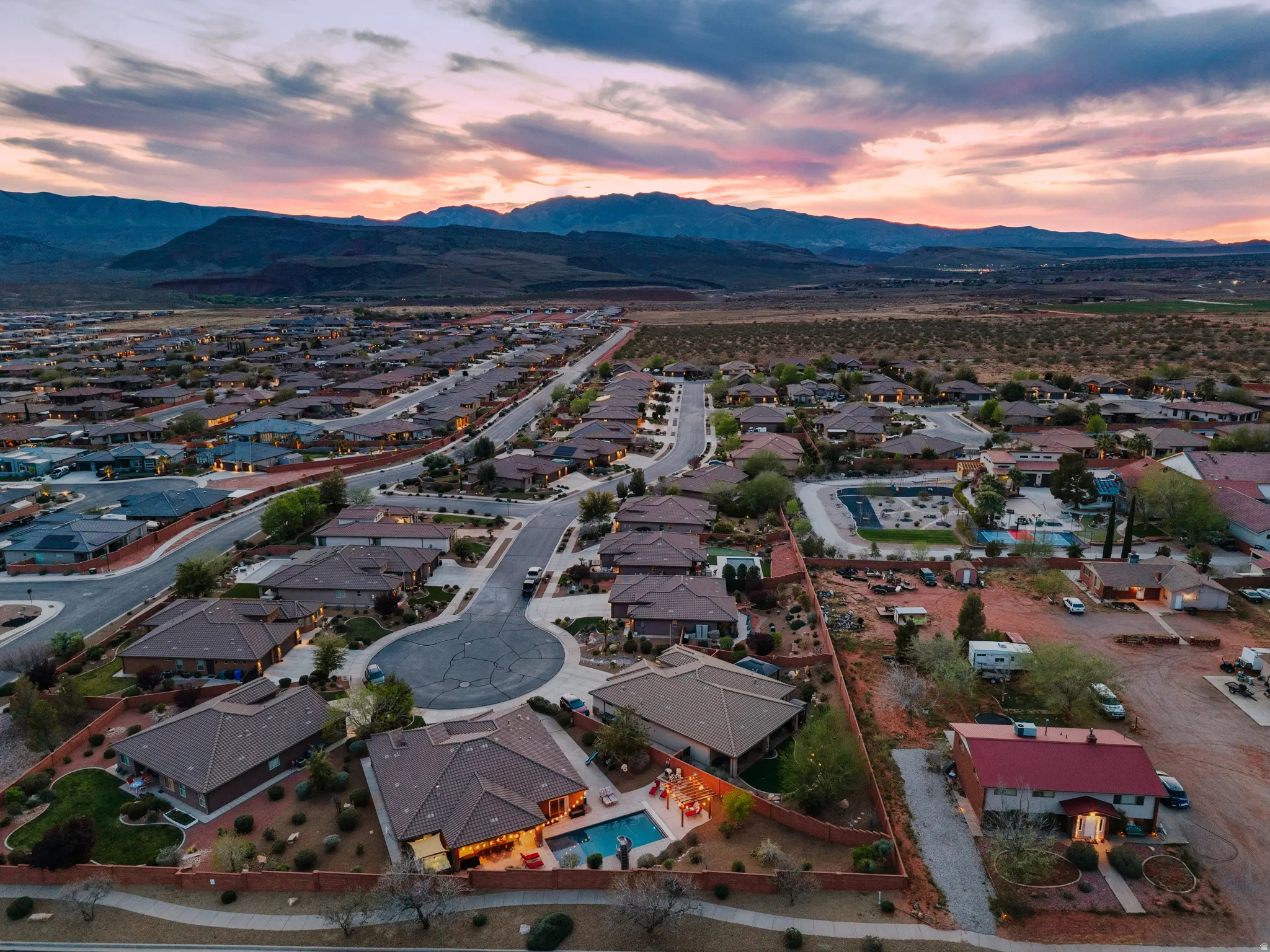 Aerial view at dusk of a mountain view and a residential view