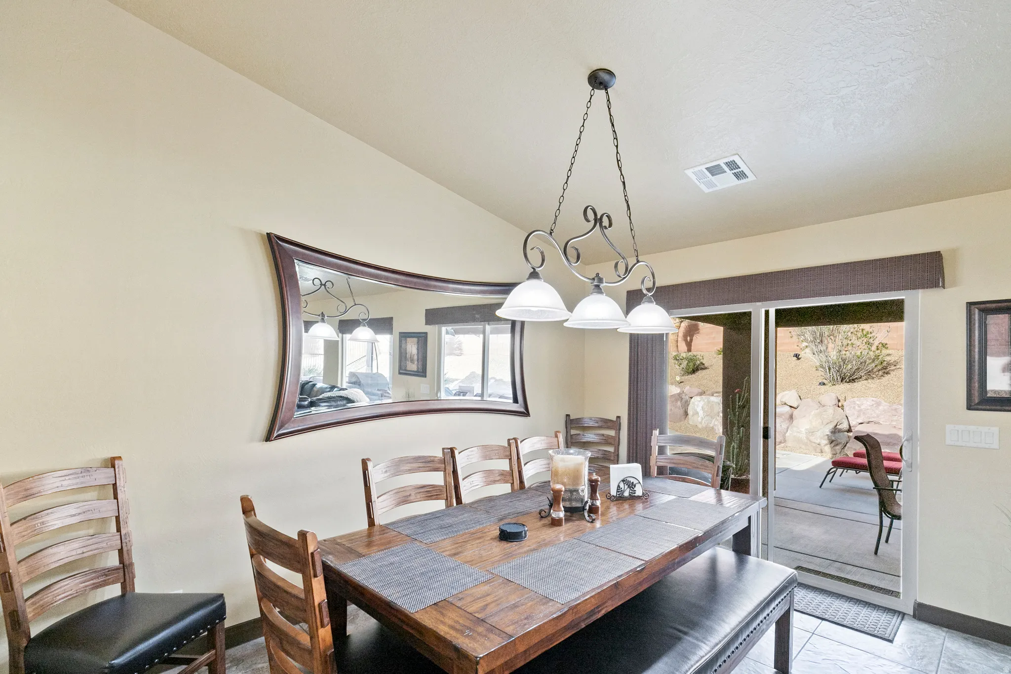 Dining space with vaulted ceiling