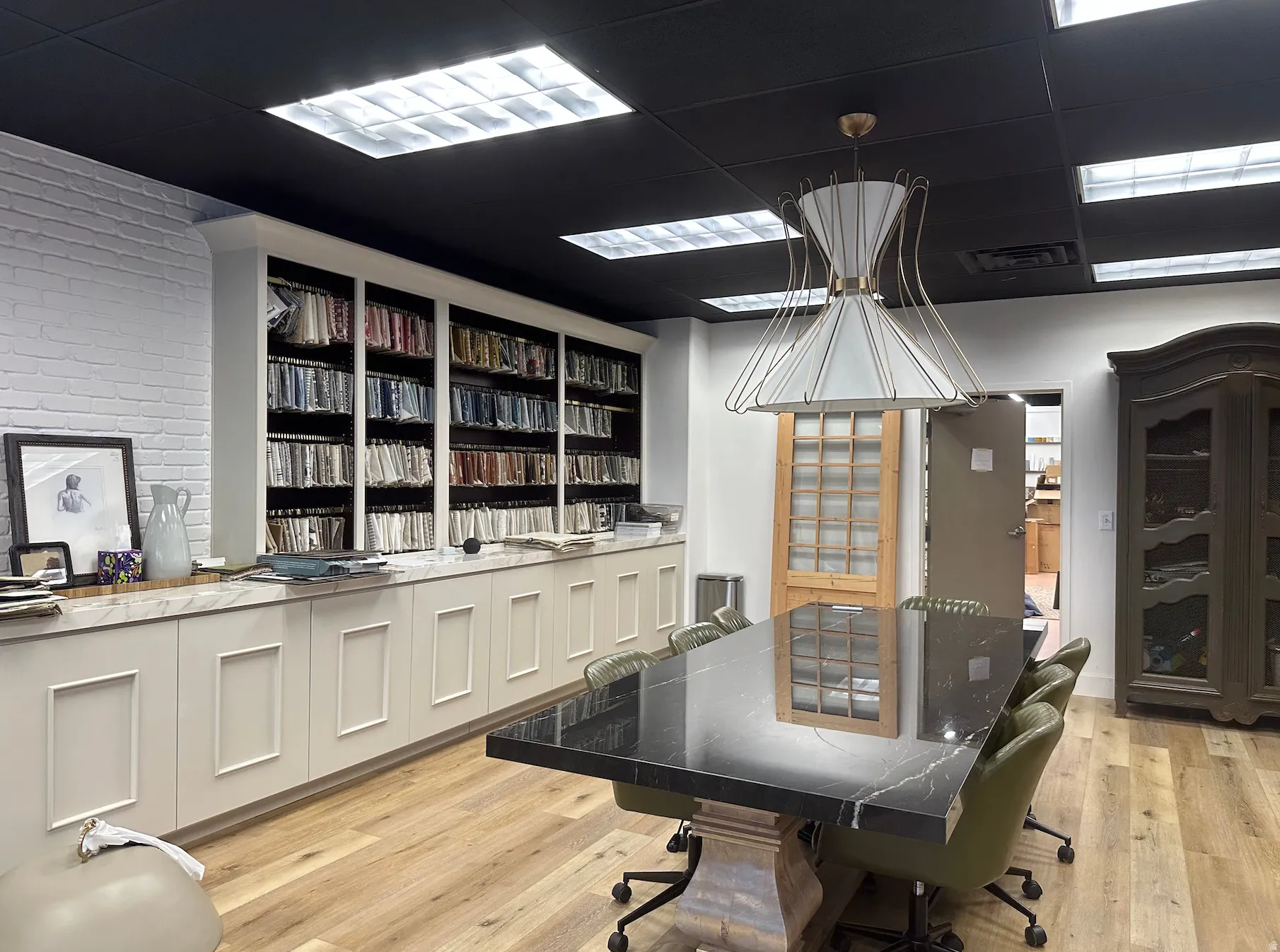 Home office featuring light wood-style floors