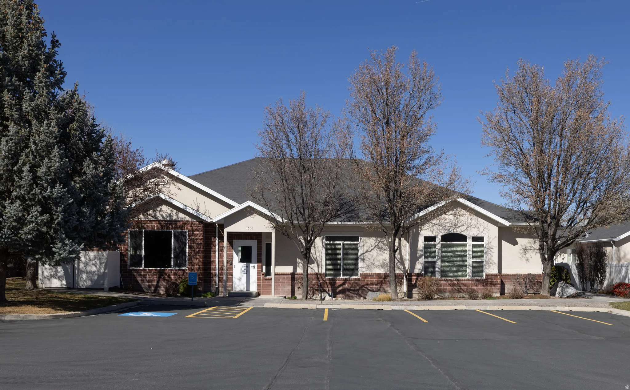 Community center with pool, spa, weight room, and gathering room.