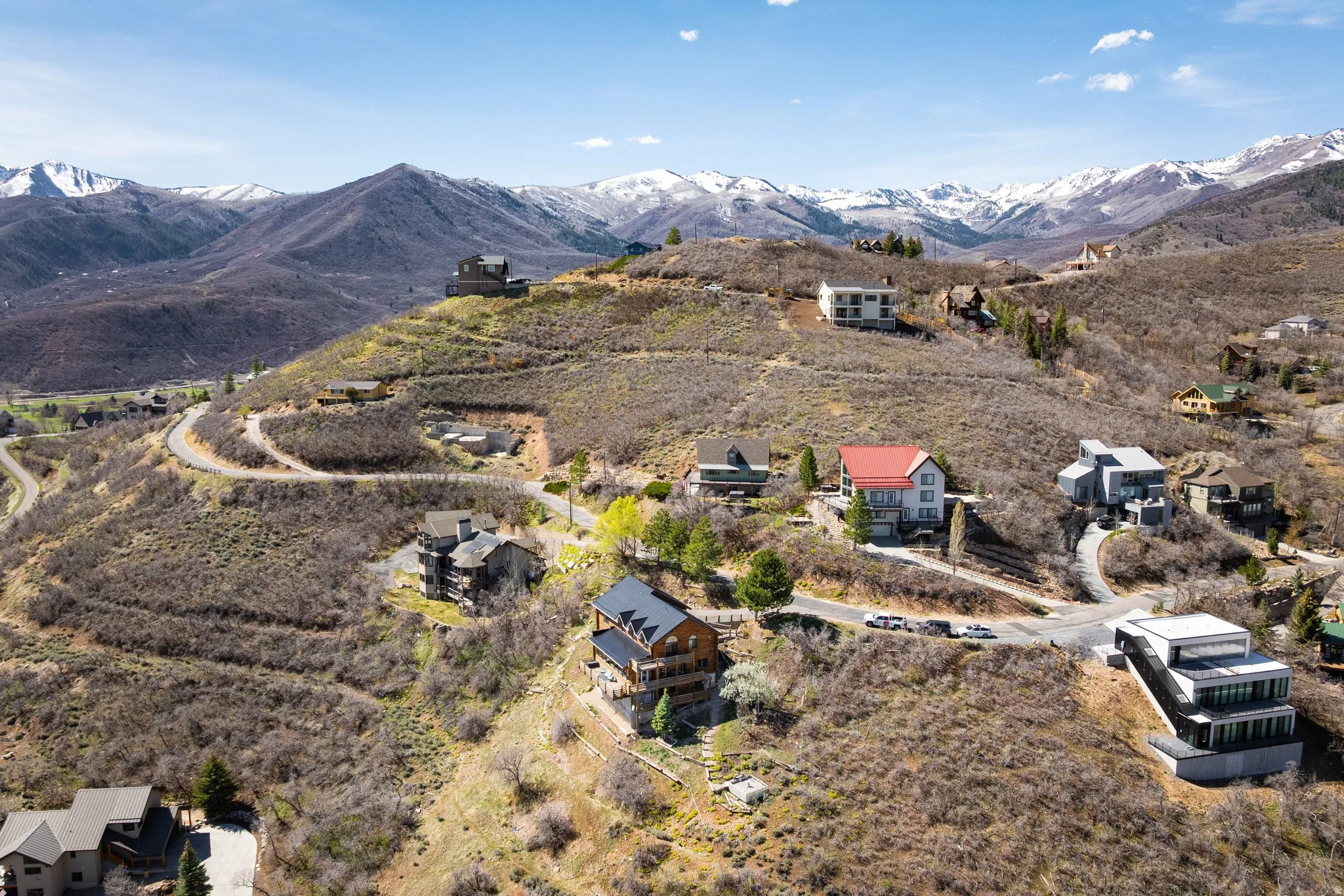 Aerial view of residential area with mountains