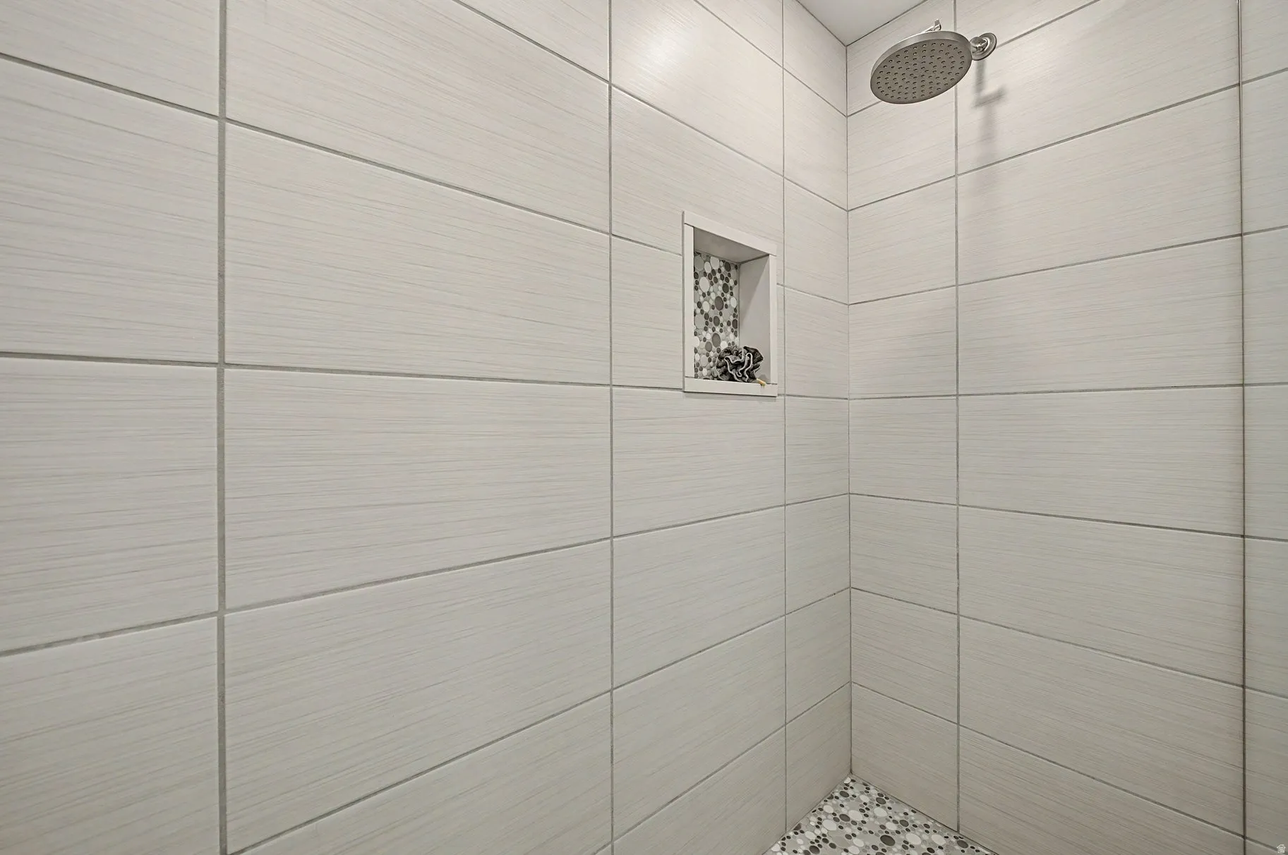 Bathroom with a tile shower