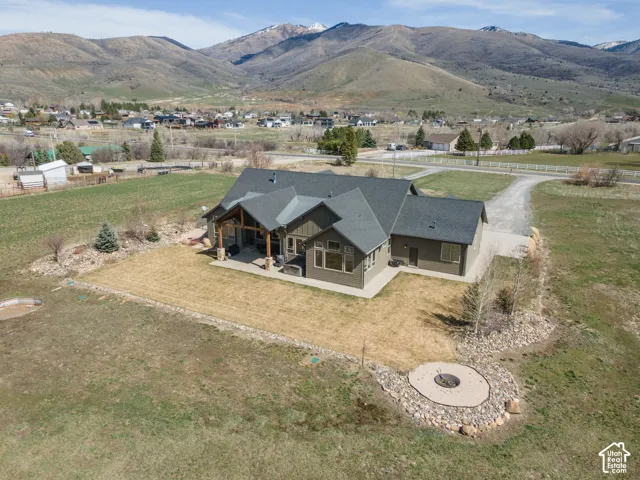 View from above of property with a mountainous background