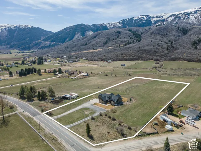 View of rural area featuring property parcel outlined and a mountainous background