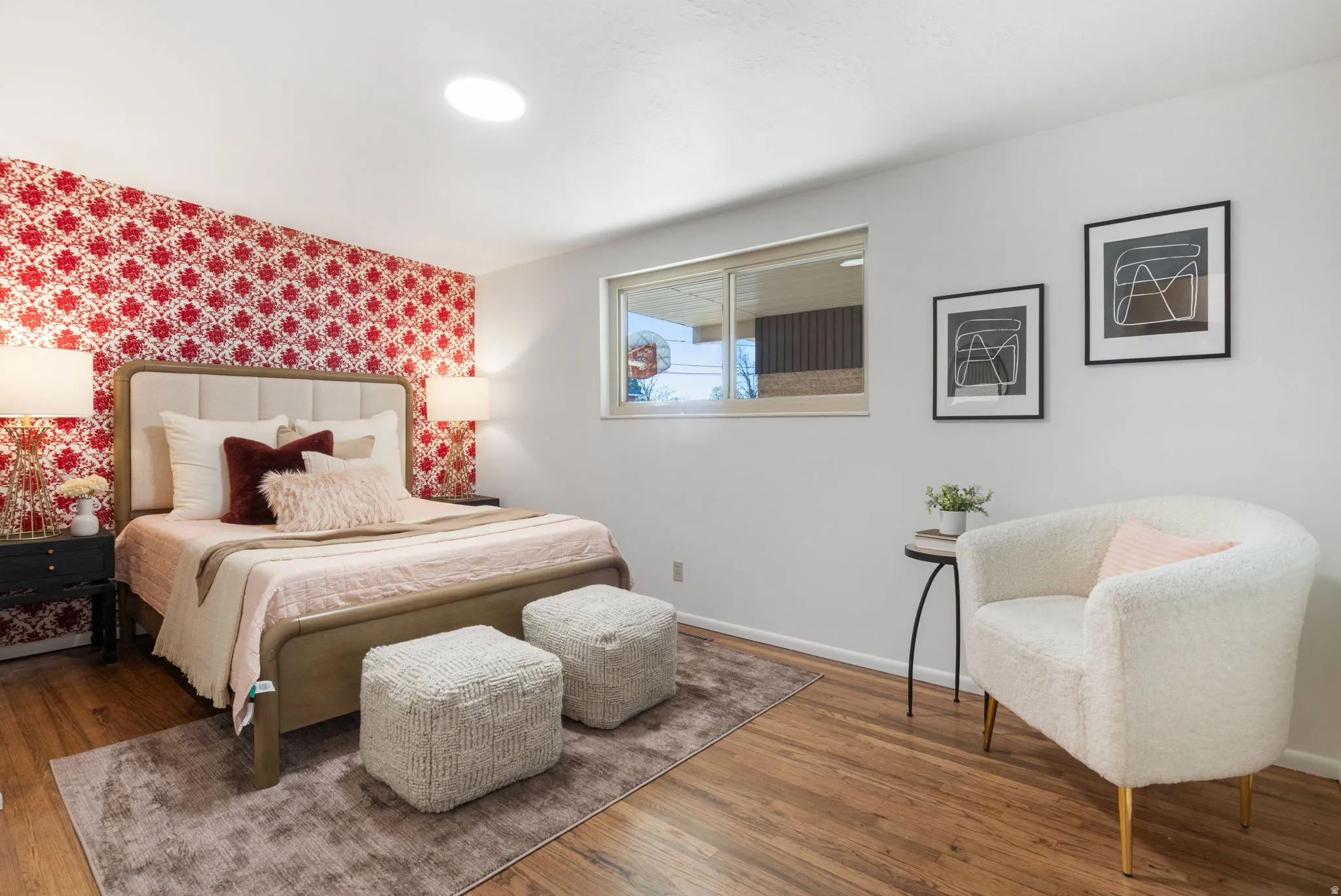 Bedroom #1- refinished hardwood floors and charming wall paper.