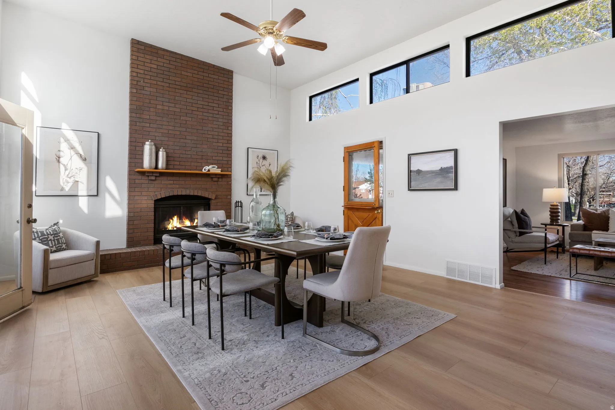 Dining area with living room in background.