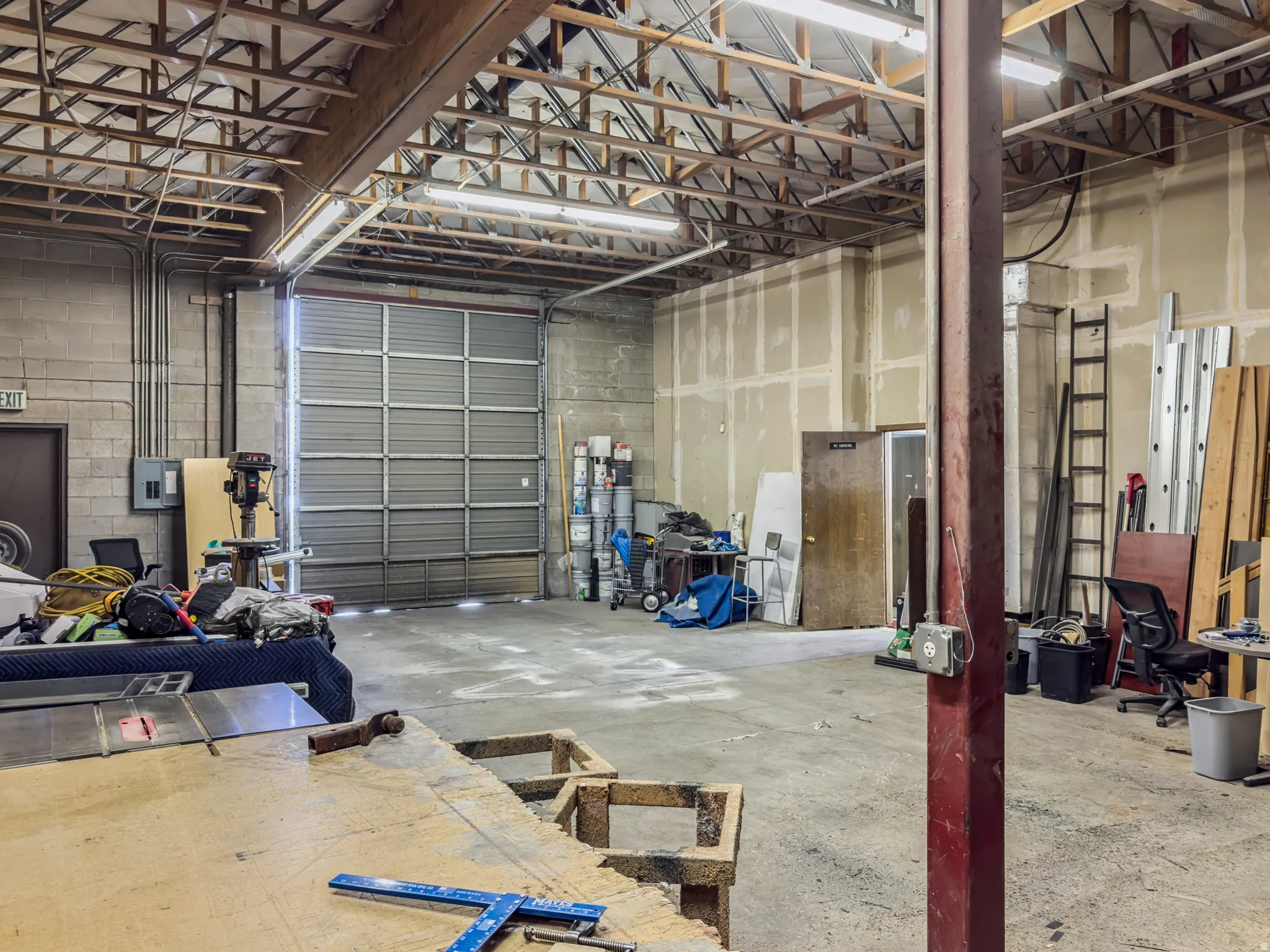 Garage featuring electric panel