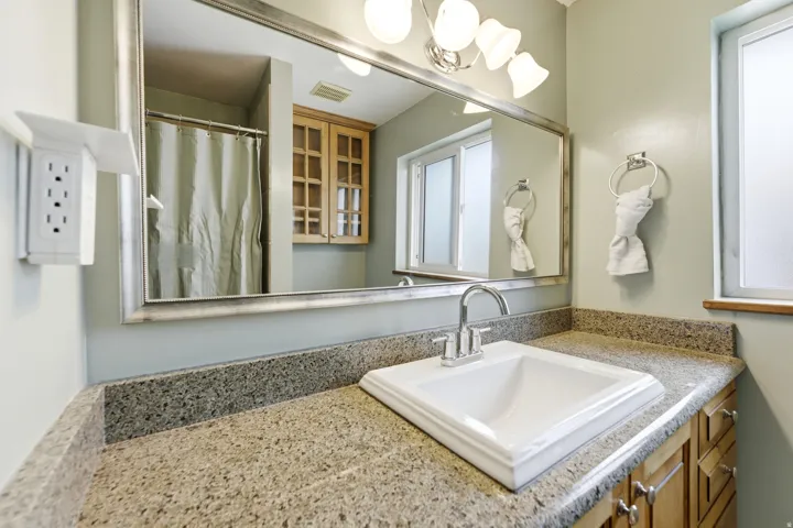 Bathroom featuring vanity and a shower with curtain
