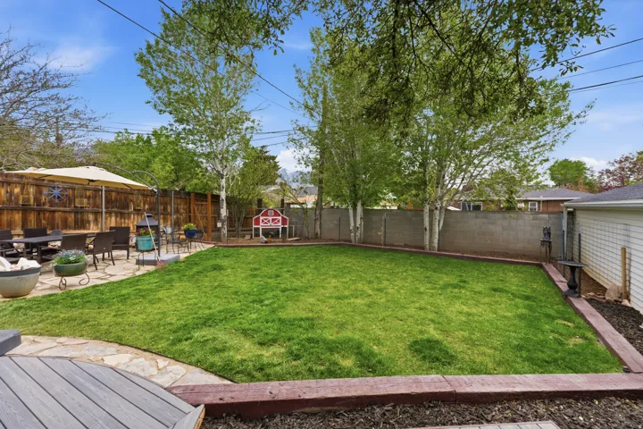 Fenced backyard featuring a patio area