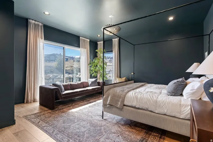 Bedroom with recessed lighting and wood-type flooring