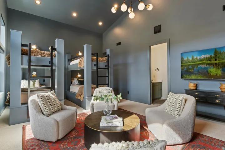 Living area featuring carpet, lofted ceiling, and recessed lighting