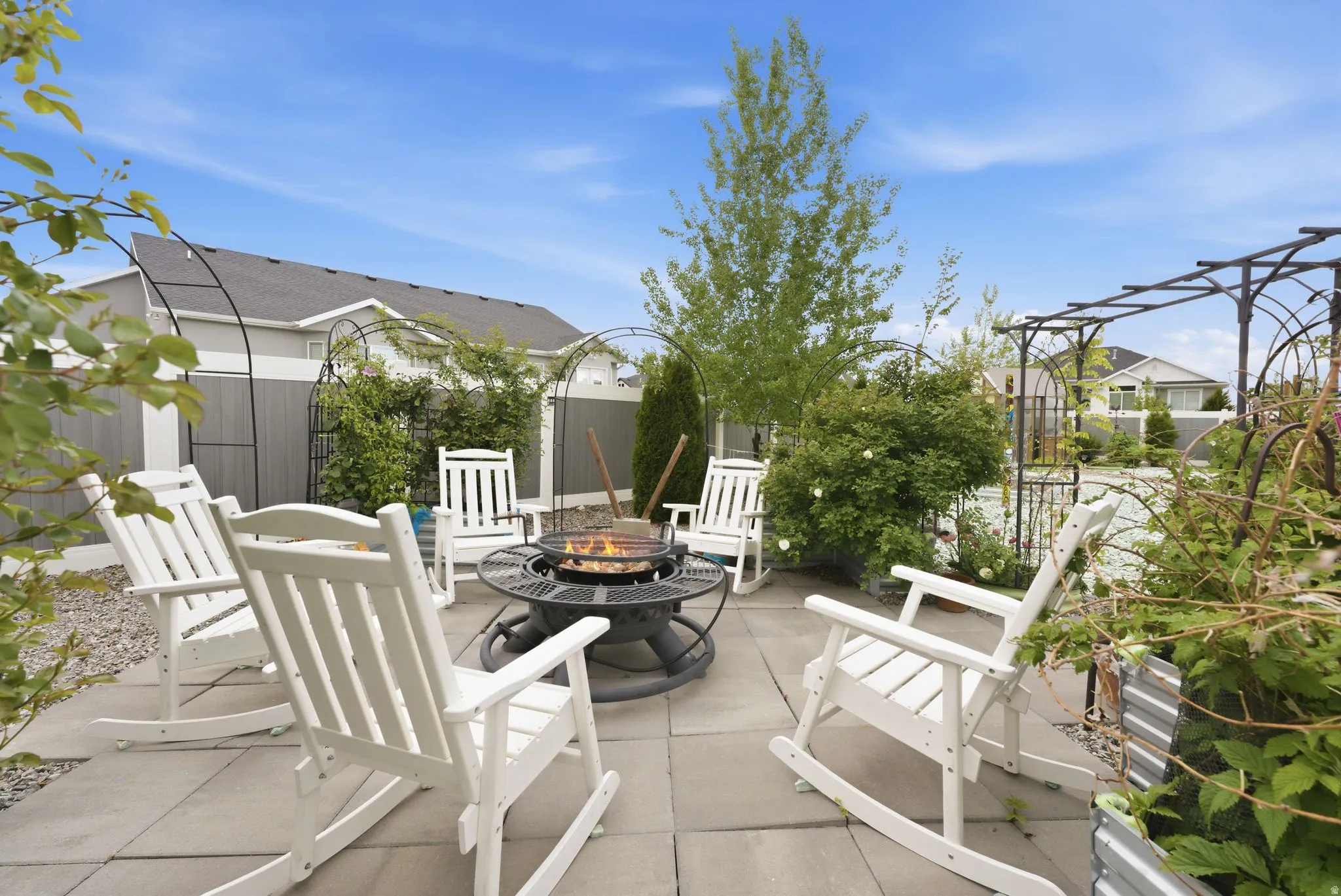 View of patio / terrace featuring an outdoor fire pit