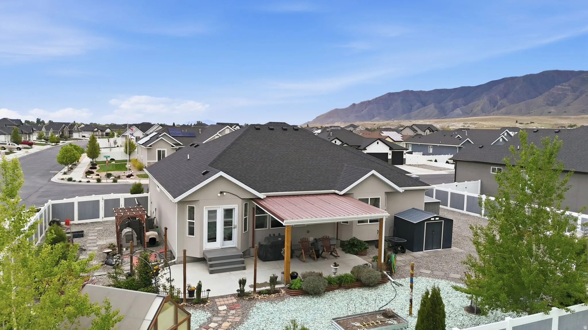 View of mountain backdrop with nearby suburban area