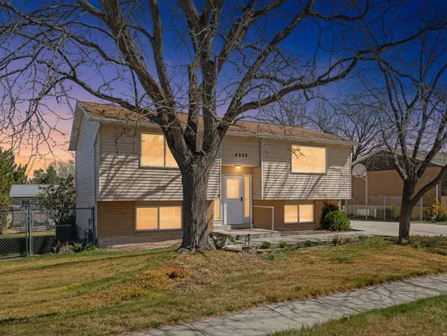 Bi-level home with brick siding