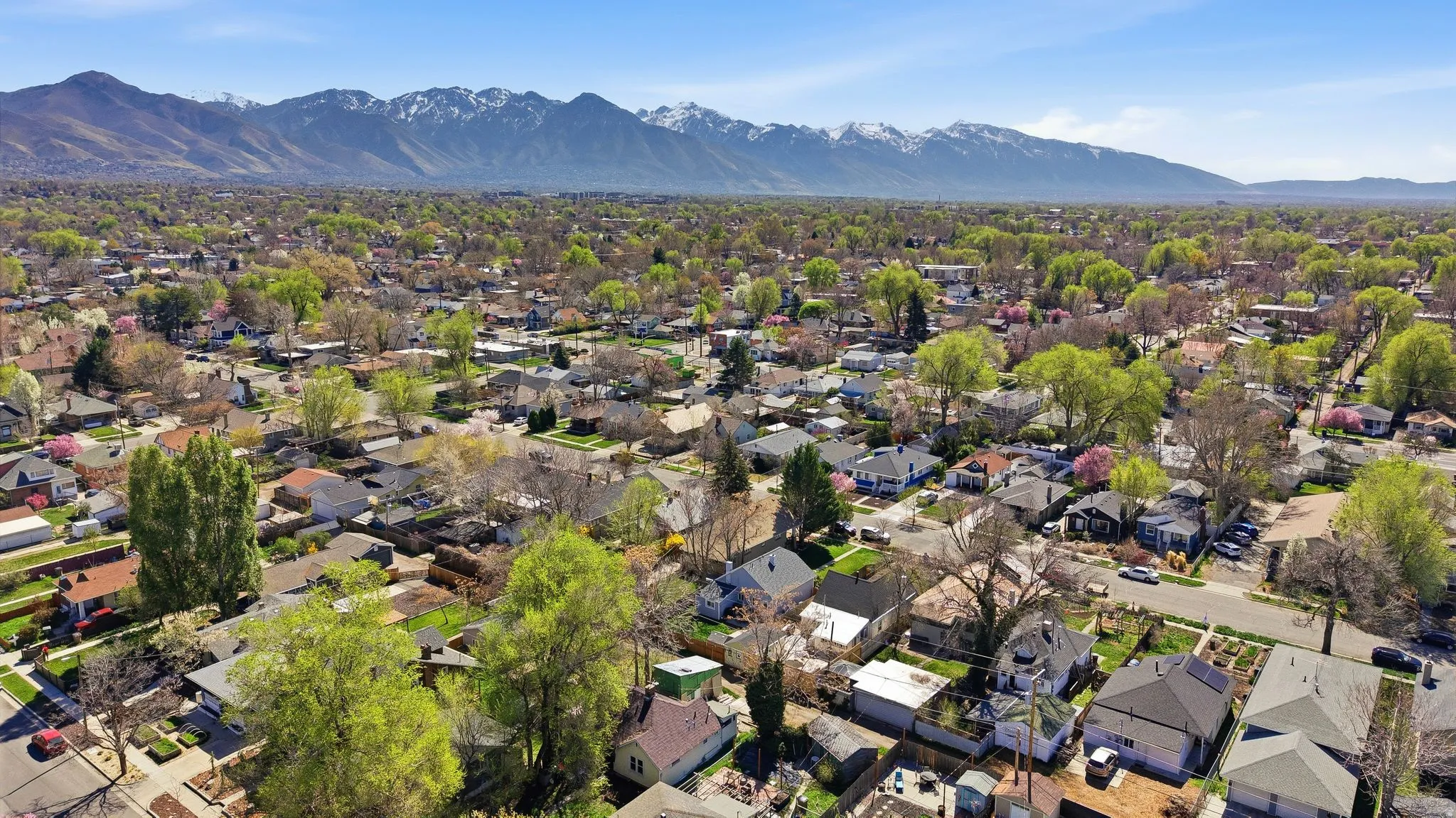 Aerial view of residential area with a mountainous background