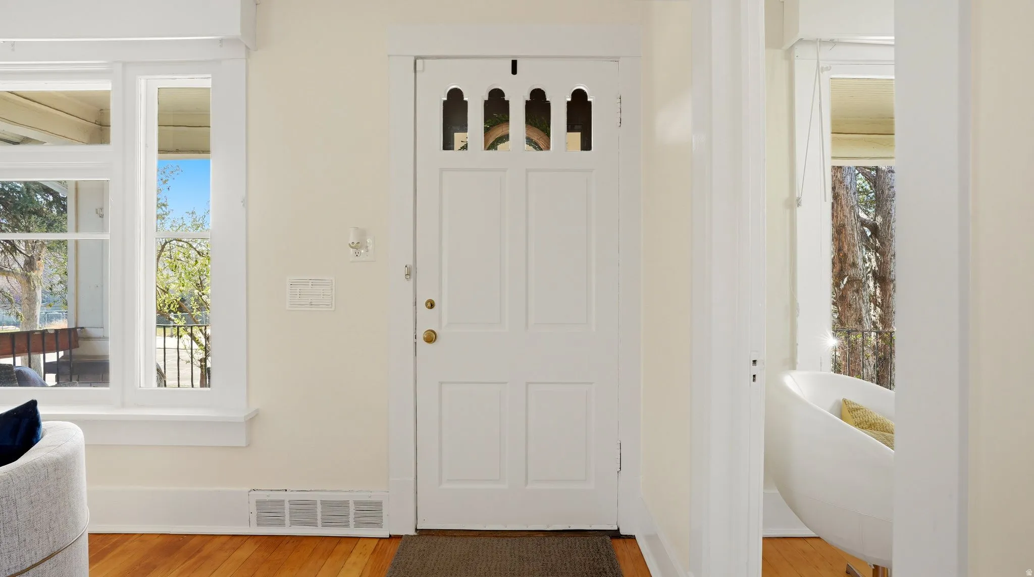 Foyer featuring light wood finished floors