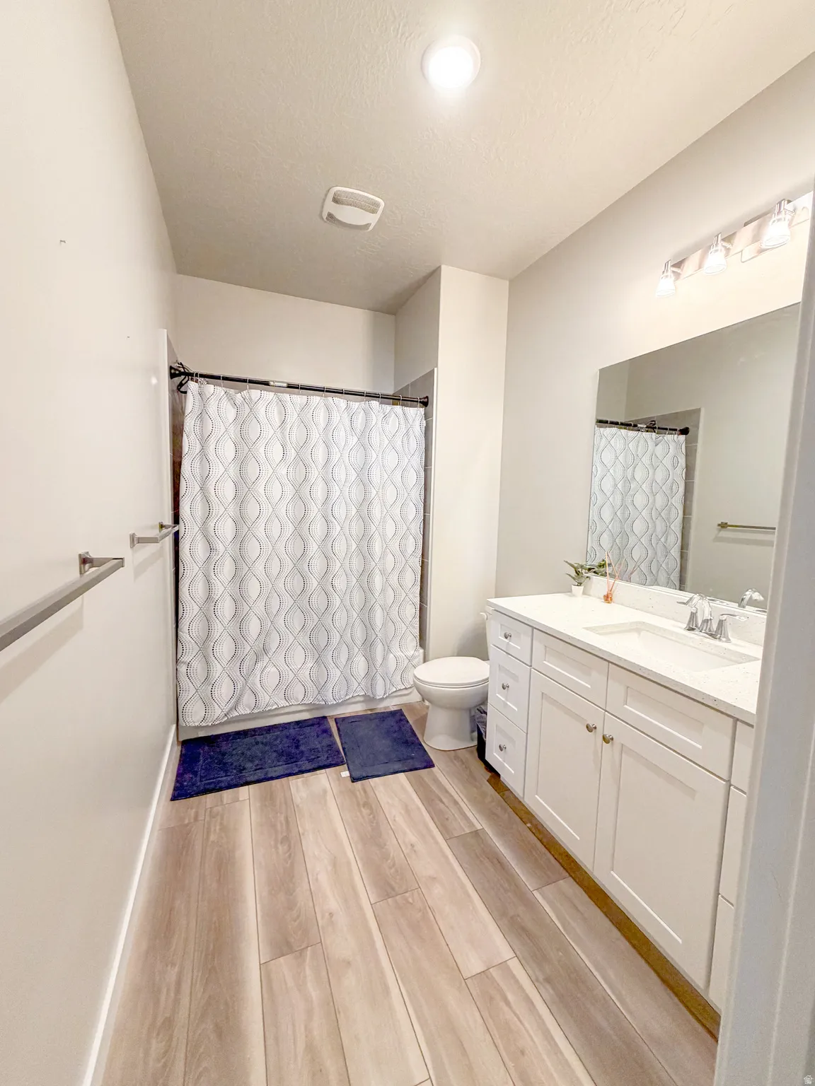 Full bathroom with vanity