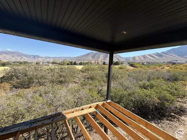 Mountain backdrop with extensive natural landscaping