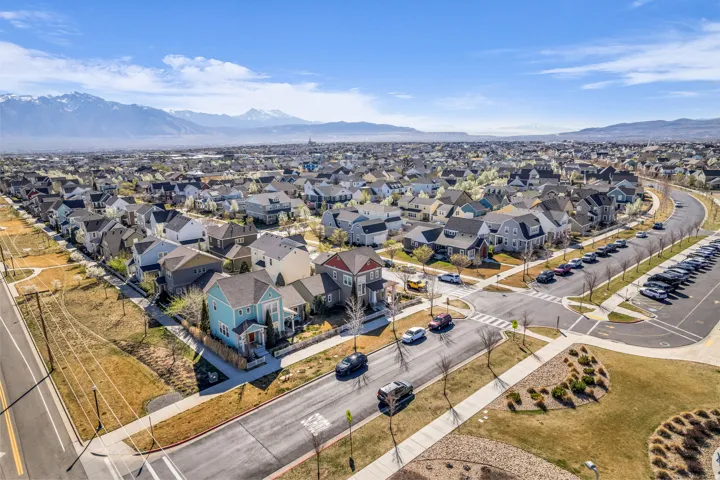 Aerial view of residential area featuring a mountain backdrop