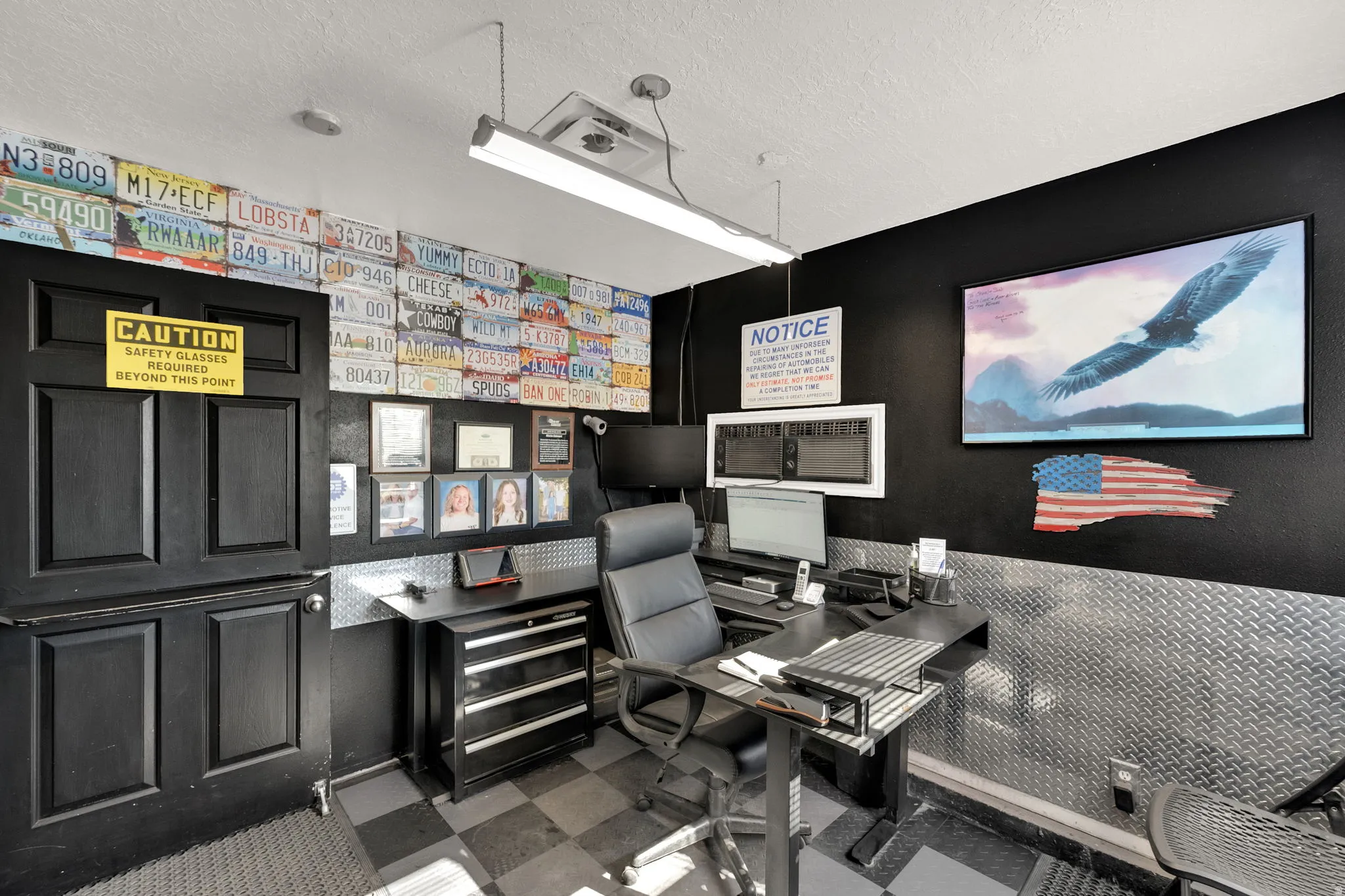 Office area featuring a textured ceiling