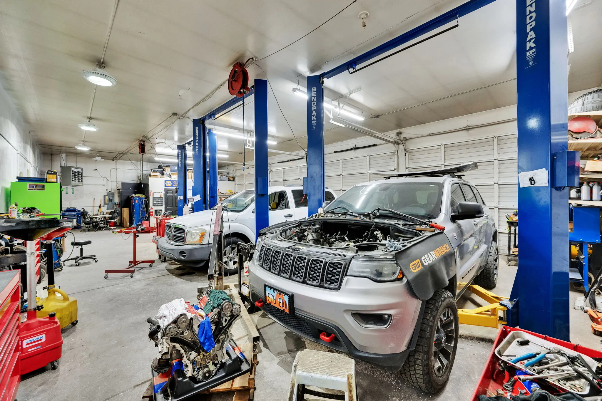 Garage featuring a heating unit