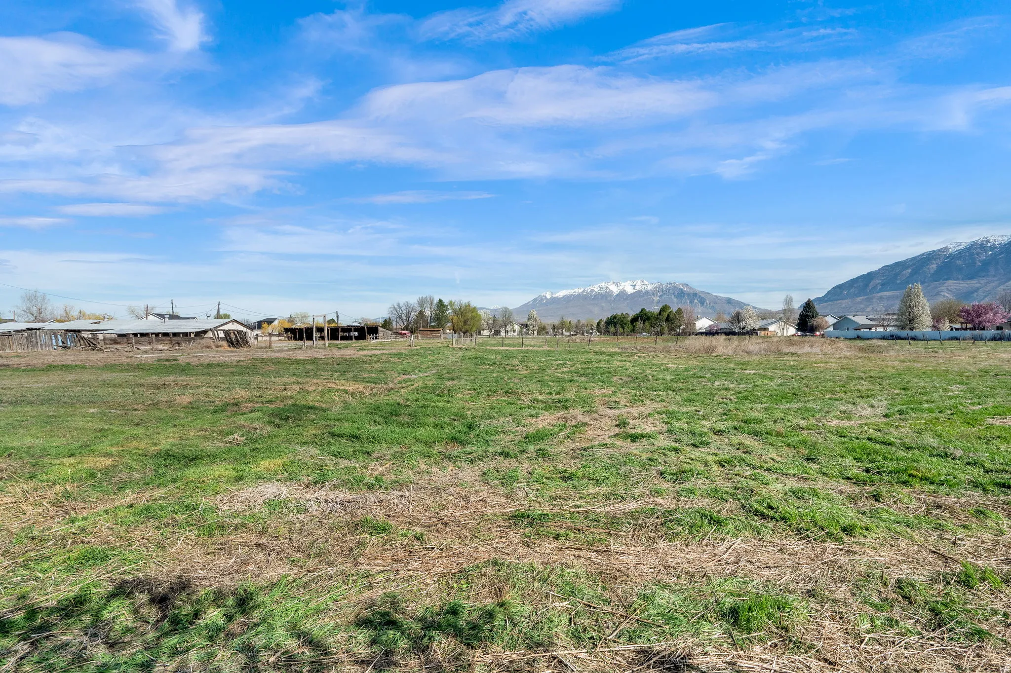View of yard featuring a rural view and a mountain view