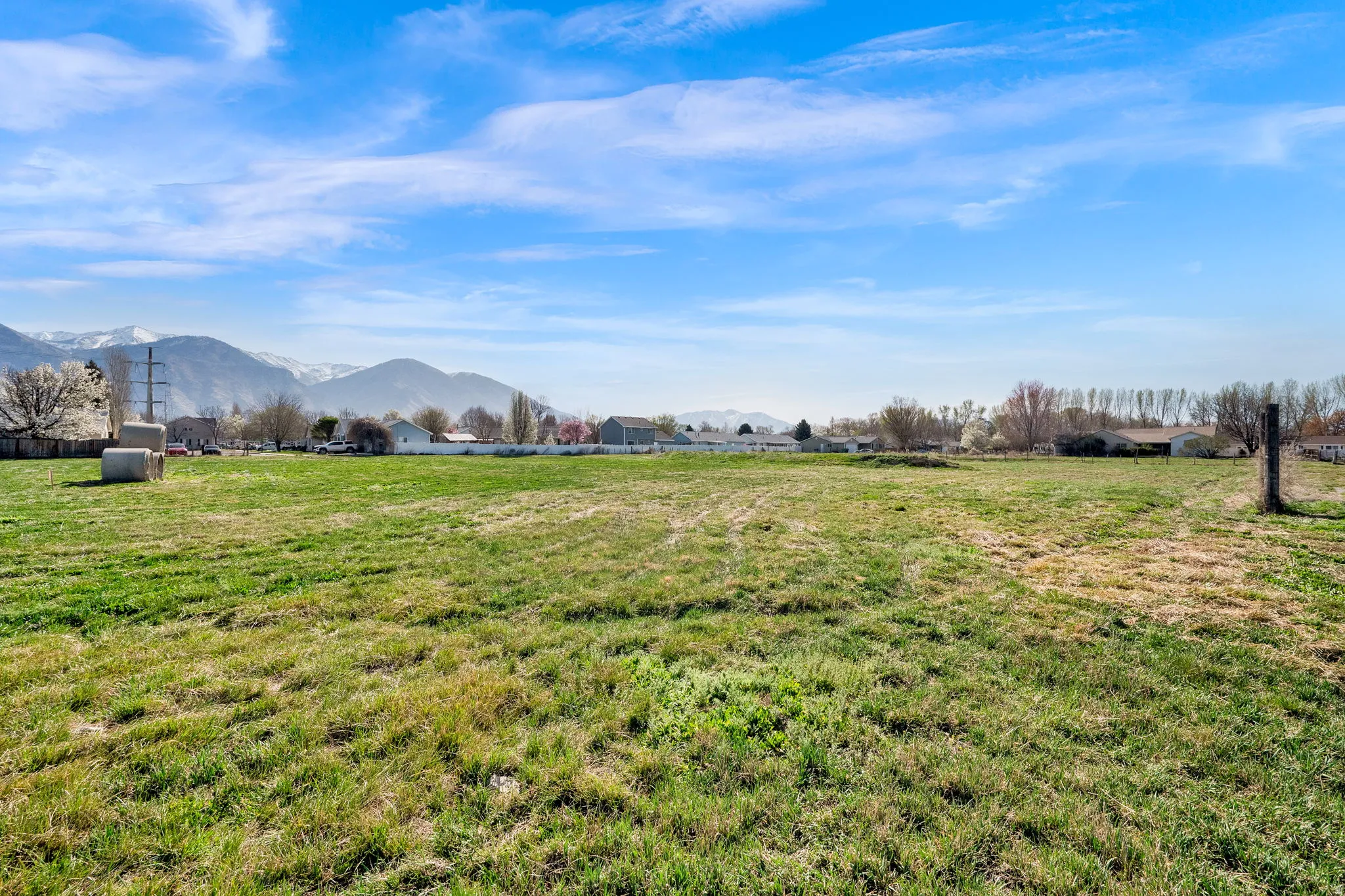 View of green lawn with a mountain view