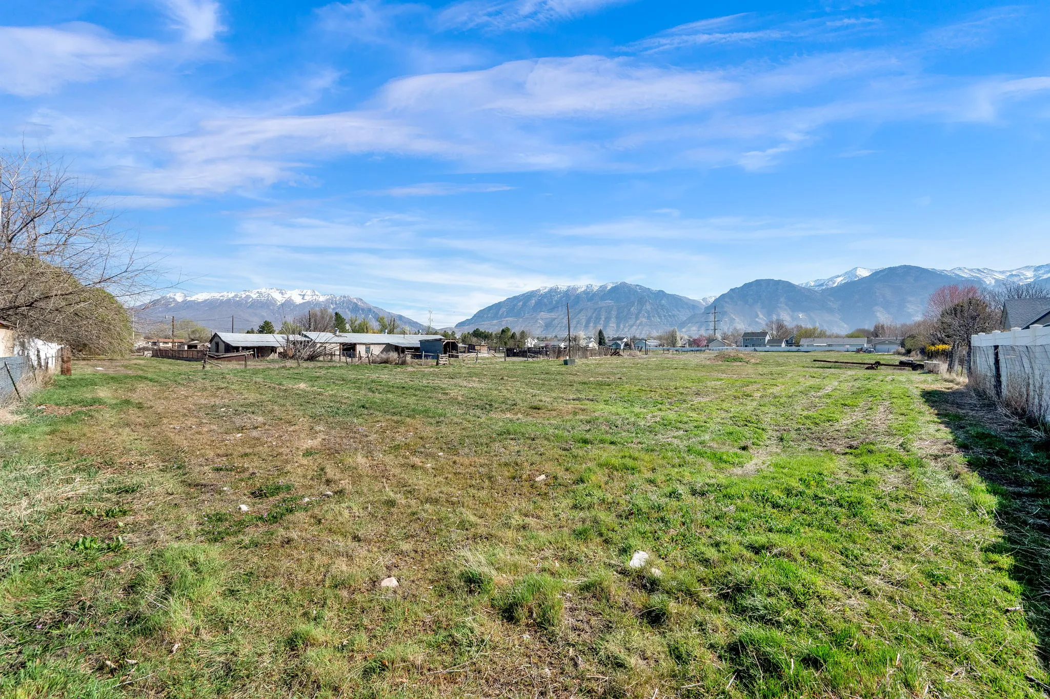 View of mountain backdrop featuring rural landscape