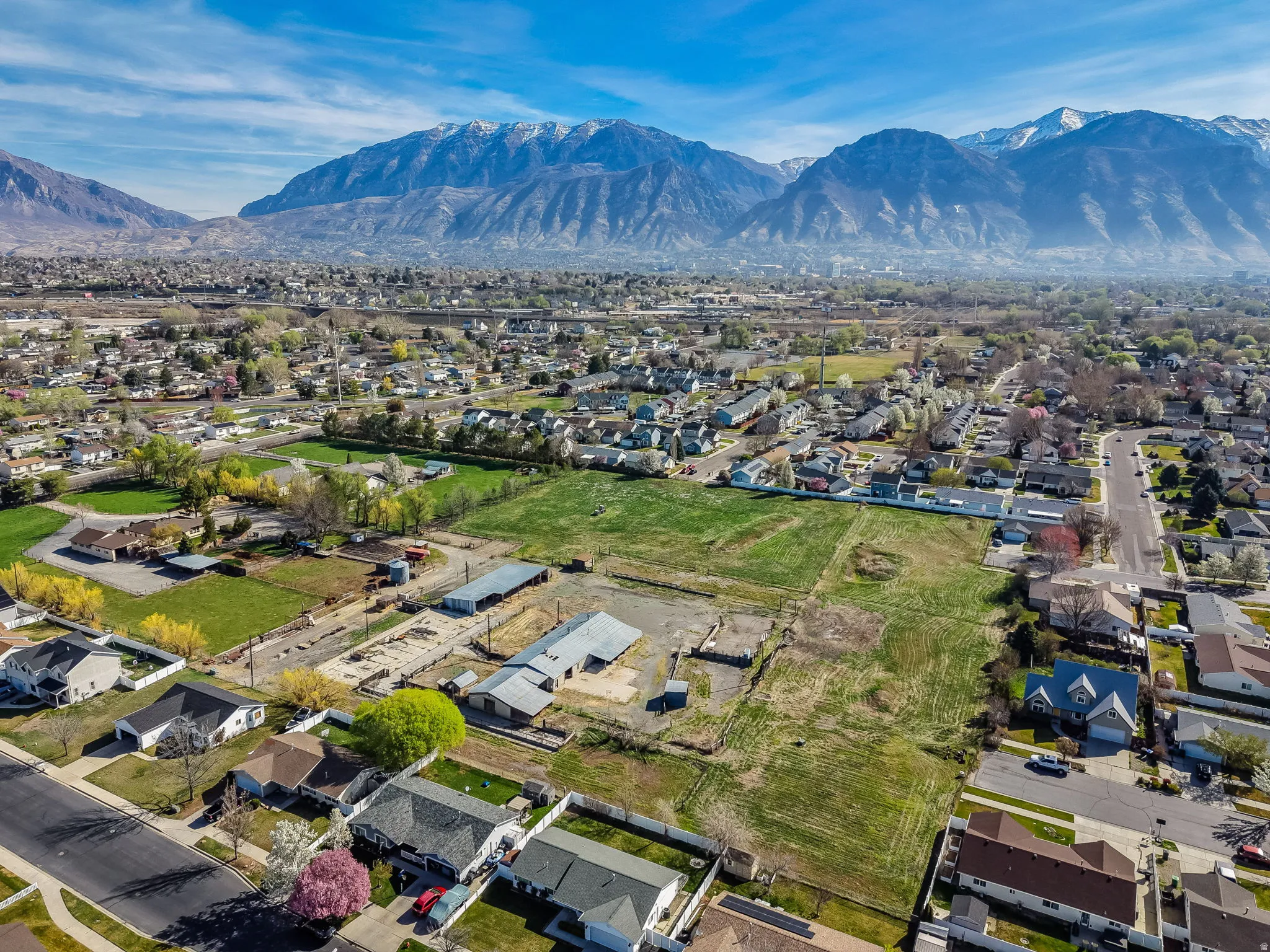 Aerial view of residential area with a mountainous background