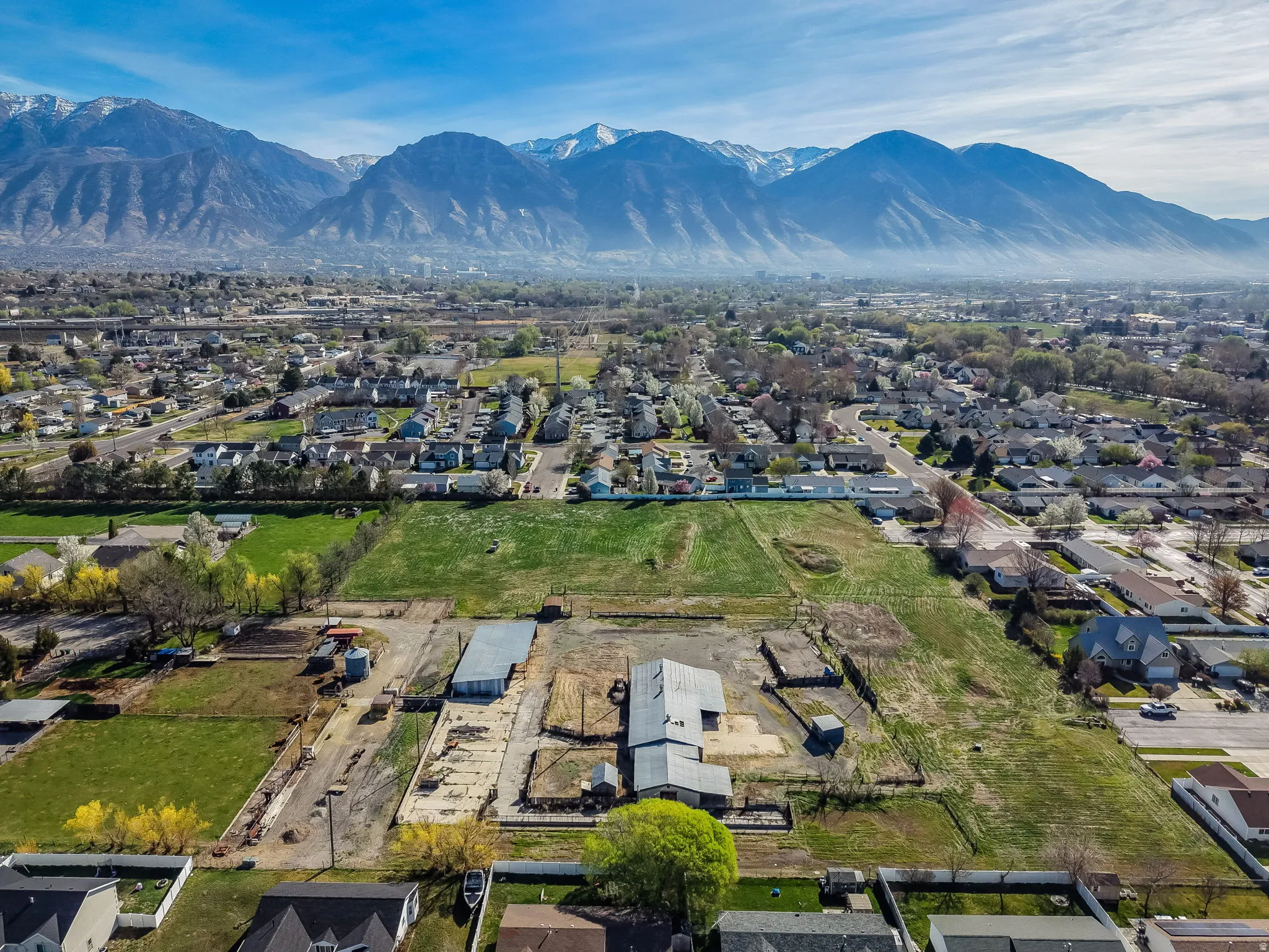 Aerial view of residential area featuring mountains