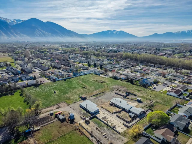 Aerial view of residential area with a mountain backdrop