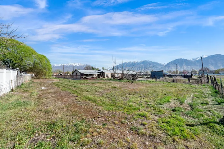 View of yard with a mountain view